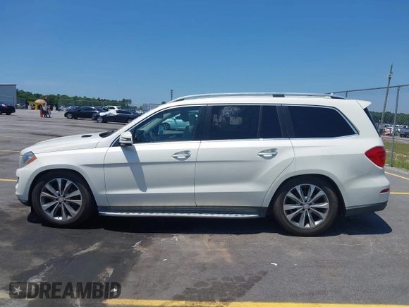 2014 Mercedes-Benz GL 450 with VIN 4JGDF7CE4EA348588, listed as a IAAI auction lot 42601136 with 129,166 mi miles and . Bid and sale history available at DreamBid. Image 15.