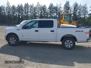 2015 Ford F-150 XLT with VIN 1FTEW1EP4FKE54734, listed as a IAAI auction lot 42137158 with 153,991 mi miles. Bid and sale history available at carsss.com. Image 14.