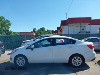 2017 Kia Rio LX z VIN KNADM4A32H6010797, wystawiony jako IAAI lot #39638075 z przebiegiem 51 977 mil mil oraz . Historia ofert i sprzedaży dostępna na DreamBid. Obrazek 14.