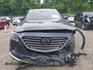2021 Mazda CX-9 Carbon Edition z VIN JM3TCBDY7M0536005, wystawiony jako IAAI lot #42424129 z przebiegiem 48 005 mil mil oraz . Historia ofert i sprzedaży dostępna na DreamBid. Obrazek 13.