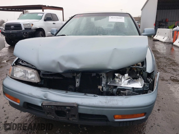 1994 Honda Accord EX w/Leather with VIN 1HGCD5657RA119657, listed as a IAAI auction lot 41528165 with 119,458 mi miles. Bid and sale history available at carsss.com. Image 6.