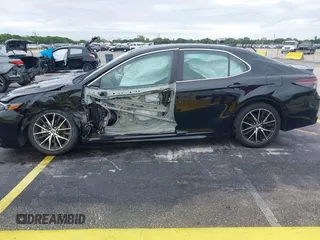 2023 Toyota Camry SE z VIN 4T1G11AK4PU121775, wystawiony jako IAAI lot #42236239 z przebiegiem 51 146 mil mil oraz . Historia ofert i sprzedaży dostępna na DreamBid. Obrazek 15.