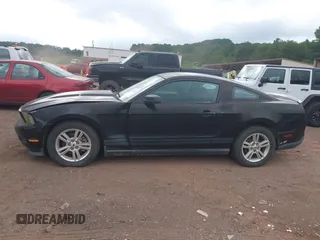 2012 Ford Mustang Premium with VIN 1ZVBP8AM6C5233888, listed as a IAAI auction lot 42714667 with 153,219 mi miles and . Bid and sale history available at DreamBid. Image 14.