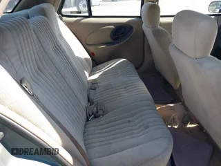 1998 Pontiac Grand Am SE with VIN 1G2NE52M2WC712123, listed as a IAAI auction lot 41939392 with 307,145 mi miles. Bid and sale history available at carsss.com. Image 8.