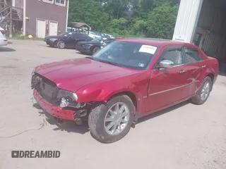 2010 Chrysler 300 Touring with VIN 2C3CK5CV0AH331268, listed as a IAAI auction lot 39666088 with 148,488 mi miles. Bid and sale history available at carsss.com. Image 2.