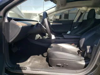 2023 Tesla Model 3 z VIN 5YJ3E1EA9PF665321, wystawiony jako Copart lot #59938995 z przebiegiem 60 679 mil mil oraz Szkoda całkowita • Salvage title. Historia ofert i sprzedaży dostępna na DreamBid. Obrazek 7.