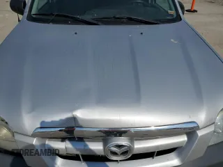2006 Mazda Tribute i with VIN 4F2YZ02Z26KM31859, listed as a Copart auction lot 48413025 with 152,663 mi miles and Salvage Title. Bid and sale history available at carsss.com. Image 12.