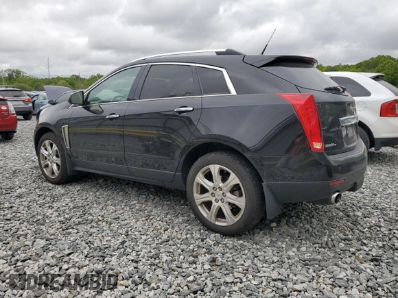 2014 Cadillac SRX Performance Collection with VIN 3GYFNFE33ES687941, listed as a Copart auction lot 57726675 with 164,059 mi miles and Clean title. Bid and sale history available at DreamBid. Image 2.