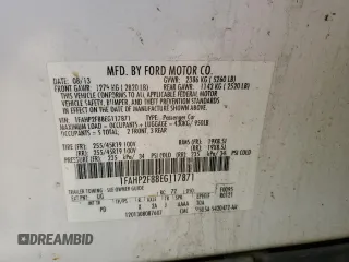 2014 Ford Taurus Limited with VIN 1FAHP2F88EG117871, listed as a Copart auction lot 52377095 with 166,699 mi miles and Clean Title. Bid and sale history available at DreamBid. Image 12.