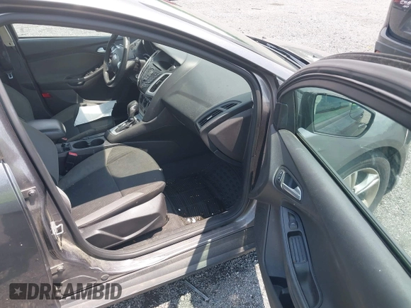 2014 Ford Focus SE z VIN 1FADP3K20EL188088, wystawiony jako IAAI lot #42455783 z przebiegiem 201 105 mil mil oraz . Historia ofert i sprzedaży dostępna na DreamBid. Obrazek 5.