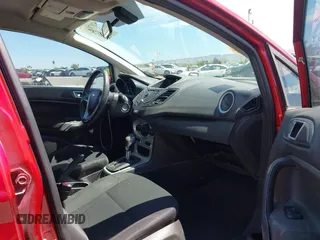 2015 Ford Fiesta SE with VIN 3FADP4BJ4FM149307, listed as a IAAI auction lot 42078091 with 124,529 mi miles. Bid and sale history available at carsss.com. Image 5.