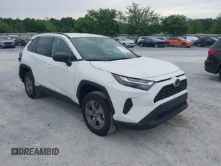 2023 Toyota RAV4 Hybrid LE z VIN 4T3LWRFV2PU092379, wystawiony jako IAAI lot #42110213 z przebiegiem 24 882 mil mil oraz . Historia ofert i sprzedaży dostępna na DreamBid. Obrazek 1.