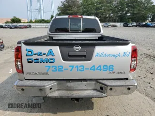 2014 Nissan Frontier SV with VIN 1N6AD0FV1EN734214, listed as a Copart auction lot 59261715 with 114,413 mi miles and Salvage title. Bid and sale history available at DreamBid. Image 6.