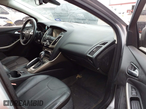 2012 Ford Focus SEL with VIN 1FAHP3H22CL102110, listed as a IAAI auction lot 41963966 with 151,538 mi miles. Bid and sale history available at carsss.com. Image 5.