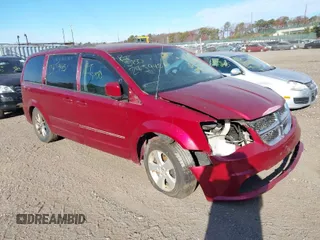 2015 Dodge Grand Caravan SE with VIN 2C4RDGBG8FR709045, listed as a IAAI auction lot 40899464 with Not Provided miles and . Bid and sale history available at DreamBid. Image 1.