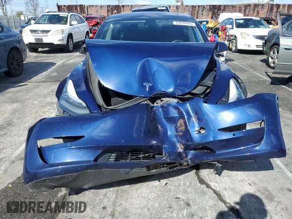 2018 Tesla Model 3 Long Range Battery z VIN 5YJ3E1EB4JF083983, wystawiony jako Copart lot #45250445 z przebiegiem 61 042 mil mil oraz Szkoda całkowita • Salvage title. Historia ofert i sprzedaży dostępna na DreamBid. Obrazek 5.