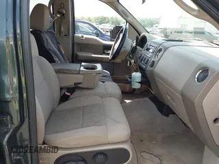 2005 Ford F-150 XLT with VIN 1FTPW14545FB49587, listed as a IAAI auction lot 42709724 with 165,193 mi miles and . Bid and sale history available at DreamBid. Image 5.