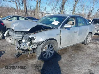 2009 Ford Taurus SEL with VIN 1FAHP24W89G104559, listed as a IAAI auction lot 41363916 with 89,297 mi miles. Bid and sale history available at carsss.com. Image 2.