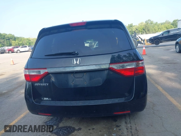 2012 Honda Odyssey EX-L with VIN 5FNRL5H60CB075811, listed as a IAAI auction lot 42518159 with 243,186 mi miles and . Bid and sale history available at DreamBid. Image 16.