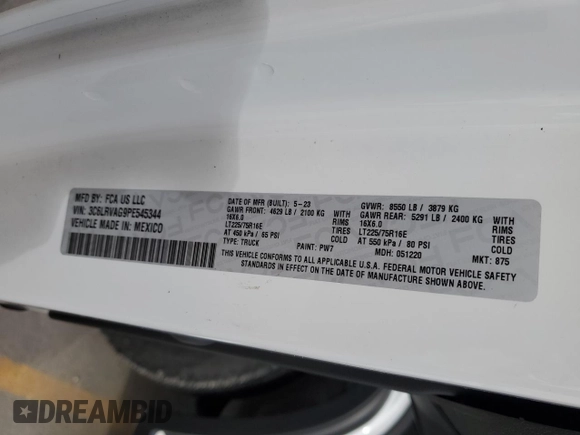 2023 Ram ProMaster Cargo with VIN 3C6LRVAG9PE545344, listed as a Copart auction lot 82880464 with 11,568 mi miles and Clean Title. Bid and sale history available at DreamBid. Image 12.