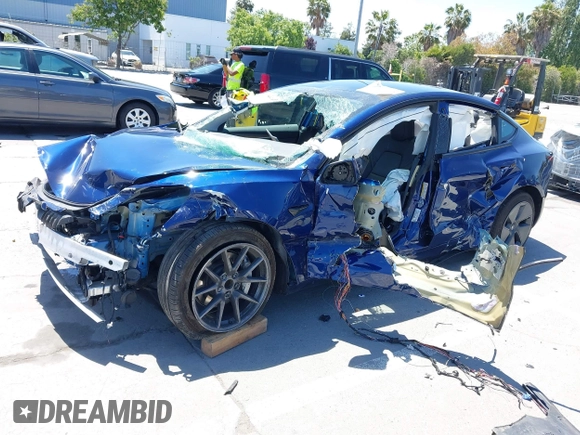 2023 Tesla Model 3 z VIN 5YJ3E1EA2PF506429, wystawiony jako IAAI lot #42320628 z przebiegiem Nie podano mil oraz . Historia ofert i sprzedaży dostępna na DreamBid. Obrazek 2.