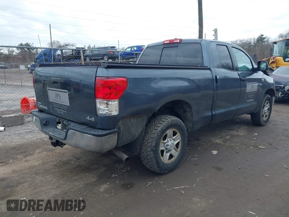 2010 Toyota Tundra with VIN 5TFUM5F16AX005232, listed as a IAAI auction lot 41688311 with 251,296 mi miles and . Bid and sale history available at DreamBid. Image 4.