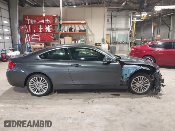 2014 BMW 4 Series 428i xDrive with VIN WBA3N9C56EF721564, listed as a IAAI auction lot 41737409 with 42,052 mi miles and . Bid and sale history available at DreamBid. Image 14.