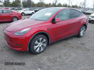 2024 Tesla Model Y Long Range with VIN 7SAYGDEE8RA232709, listed as a IAAI auction lot 41724484 with 5,376 mi miles and . Bid and sale history available at DreamBid. Image 2.