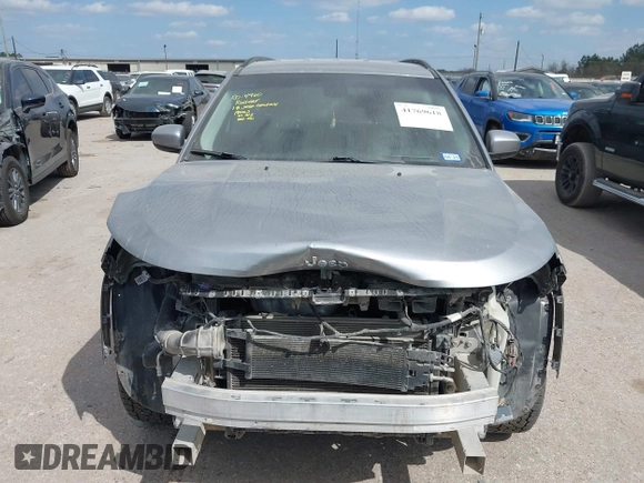 2018 Jeep Compass Latitude z VIN 3C4NJDBBXJT180665, wystawiony jako IAAI lot #41769618 z przebiegiem 128 309 mil mil oraz . Historia ofert i sprzedaży dostępna na DreamBid. Obrazek 12.
