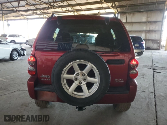 2007 Jeep Liberty Limited with VIN 1J8GL58K37W597251, listed as a Copart auction lot 52823045 with 227,191 mi miles and Salvage title. Bid and sale history available at DreamBid. Image 6.