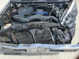 1996 Nissan Frontier XE z VIN 1N6SD11S0TC311270, wystawiony jako Copart lot #53870965 z przebiegiem 145 595 mil mil oraz Szkoda całkowita • Salvage title. Historia ofert i sprzedaży dostępna na DreamBid. Obrazek 11.