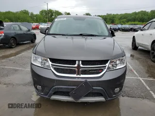 2017 Dodge Journey SXT z VIN 3C4PDCBG4HT514494, wystawiony jako Copart lot #55335735 z przebiegiem 101 670 mil mil oraz Szkoda całkowita • Salvage title. Historia ofert i sprzedaży dostępna na DreamBid. Obrazek 5.