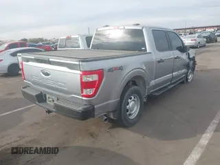 2023 Ford F-150 XL with VIN 1FTFW1ED9PFA89505, listed as a IAAI auction lot 41260198 with 56,805 mi miles. Bid and sale history available at carsss.com. Image 4.
