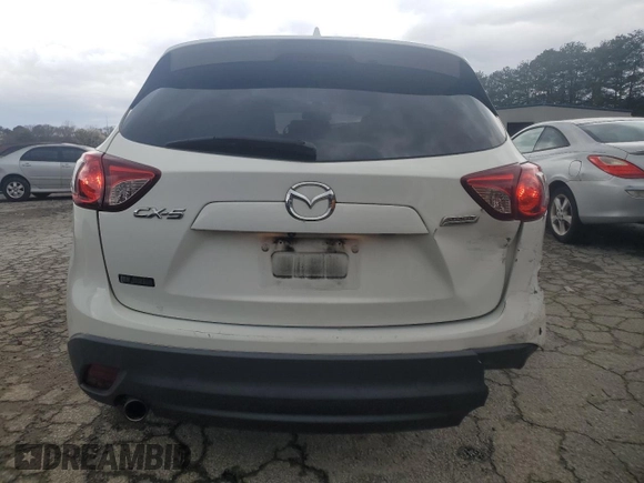 2015 Mazda CX-5 Grand Touring with VIN JM3KE2DY6F0504784, listed as a Copart auction lot 47671705 with 174,682 mi miles and Salvage Title. Bid and sale history available at carsss.com. Image 6.
