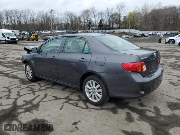 2009 Toyota Corolla with VIN JTDBL40E599071285, listed as a Copart auction lot 52786115 with 193,191 mi miles and Salvage Title. Bid and sale history available at carsss.com. Image 2.