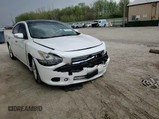 2014 Nissan Maxima SV z VIN 1N4AA5AP0EC439334, wystawiony jako Copart lot #54109875 z przebiegiem 131 592 mil mil oraz Szkoda całkowita • Salvage title. Historia ofert i sprzedaży dostępna na DreamBid. Obrazek 13.