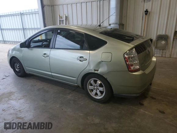 2007 Toyota Prius z VIN JTDKB20U577556730, wystawiony jako Copart lot #61117255 z przebiegiem Nie podano mil oraz Nie do naprawy • Non repairable. Historia ofert i sprzedaży dostępna na DreamBid. Obrazek 2.