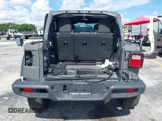 2019 Jeep Wrangler Unlimited Rubicon with VIN 1C4HJXFN9KW507281, listed as a IAAI auction lot 42695939 with 60,802 mi miles and . Bid and sale history available at DreamBid. Image 17.