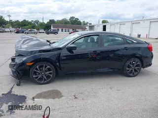 2019 Honda Civic Sport with VIN 19XFC2F85KE015159, listed as a IAAI auction lot 41993276 with 82,542 mi miles and . Bid and sale history available at DreamBid. Image 15.