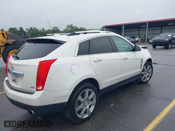 2012 Cadillac SRX Performance Collection with VIN 3GYFNBE38CS547423, listed as a IAAI auction lot 42276365 with 157,786 mi miles and . Bid and sale history available at DreamBid. Image 4.