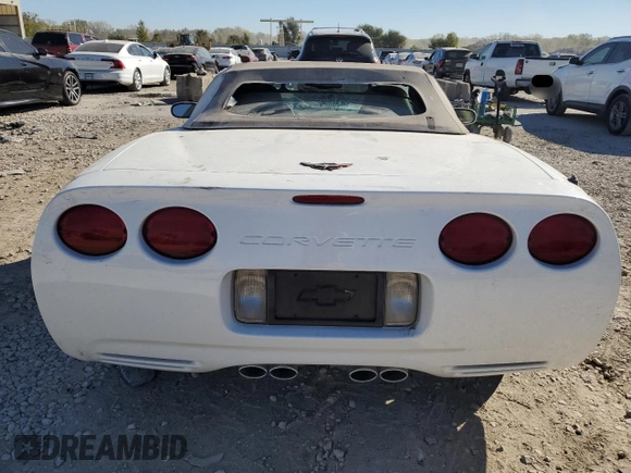 2004 Chevrolet Corvette with VIN 1G1YY32G145107647, listed as a Copart auction lot 76517714 with 3,303 mi miles and Salvage Title. Bid and sale history available at carsss.com. Image 6.