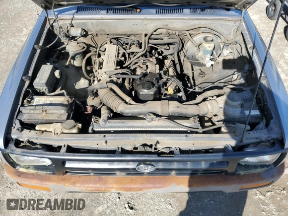 1993 Toyota Pickup z VIN 4TARN81AXPZ113969, wystawiony jako Copart lot #51845495 z przebiegiem 278 277 mil mil oraz Czysty tytuł • Clean title. Historia ofert i sprzedaży dostępna na DreamBid. Obrazek 11.