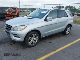 2012 Mercedes-Benz M ML 350 with VIN 4JGDA5HB5CA012821, listed as a IAAI auction lot 42128070 with 94,749 mi miles. Bid and sale history available at carsss.com. Image 2.