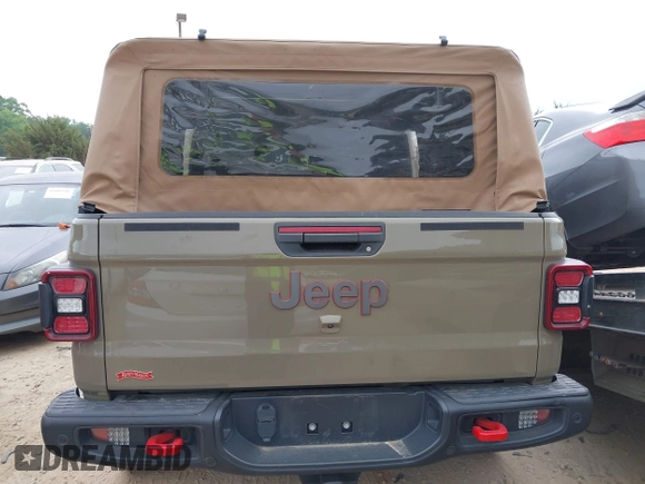 2020 Jeep Gladiator Rubicon z VIN 1C6JJTBG6LL179541, wystawiony jako IAAI lot #42050510 z przebiegiem 52 784 mil mil oraz . Historia ofert i sprzedaży dostępna na DreamBid. Obrazek 15.
