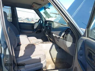 1998 Jeep Cherokee Sport with VIN 1J4FT68S0WL231959, listed as a IAAI auction lot 41680076 with 252,369 mi miles. Bid and sale history available at carsss.com. Image 5.