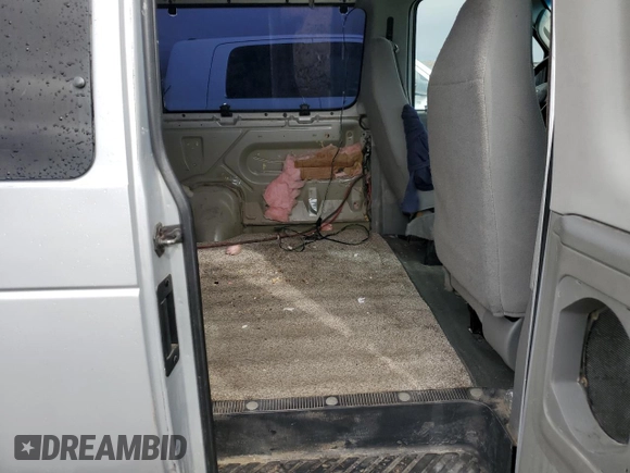 2008 Ford Econoline Passenger XL with VIN 1FBNE31LX8DA20587, listed as a Copart auction lot 47973485 with 218,047 mi miles and Clean Title. Bid and sale history available at carsss.com. Image 11.