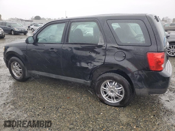 2011 Mazda Tribute Touring with VIN 4F2CY0C79BKM01536, listed as a Copart auction lot 43838095 with 68,271 mi miles and Salvage Title. Bid and sale history available at carsss.com. Image 2.