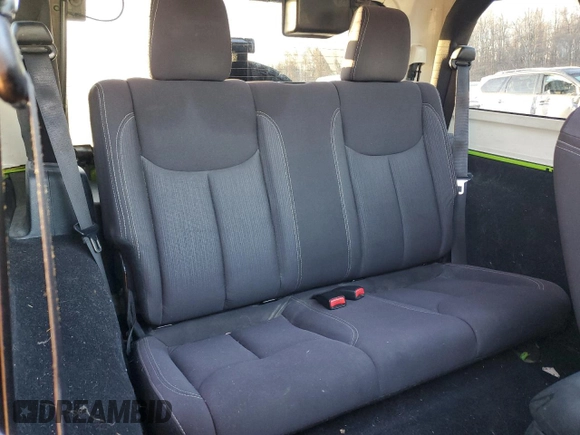 2013 Jeep Wrangler Rubicon 10th Anniversary with VIN 1C4BJWCG0DL506174, listed as a Copart auction lot 85300514 with 133,974 mi miles and Salvage Title. Bid and sale history available at DreamBid. Image 11.