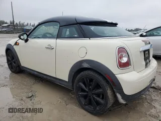 2014 MINI Cooper Coupe with VIN WMWSX1C53ET507947, listed as a Copart auction lot 42087585 with 113,068 mi miles and Salvage Title. Bid and sale history available at carsss.com. Image 2.