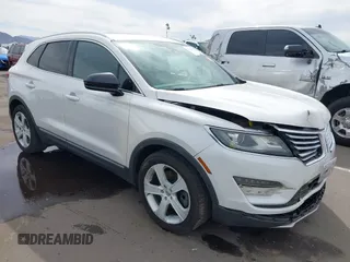 2015 Lincoln MKC z VIN 5LMTJ2AH9FUJ25857, wystawiony jako IAAI lot #41814972 z przebiegiem 99 987 mil mil oraz . Historia ofert i sprzedaży dostępna na DreamBid. Obrazek 1.